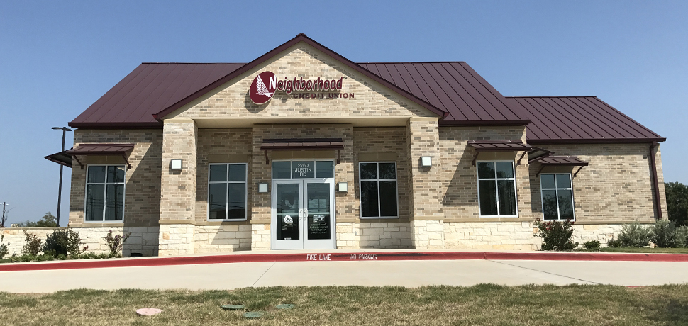 Building with logo sign